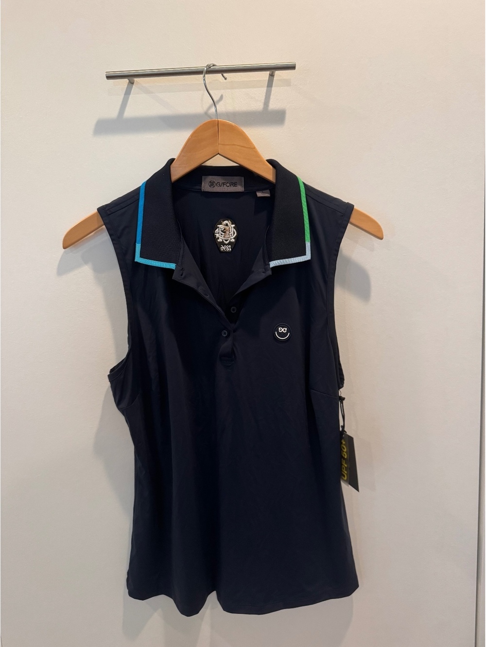 G/FORE navy sleeveless polo top